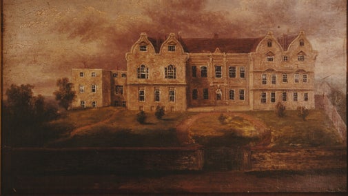 Photograph of a painting of a house in the landscape